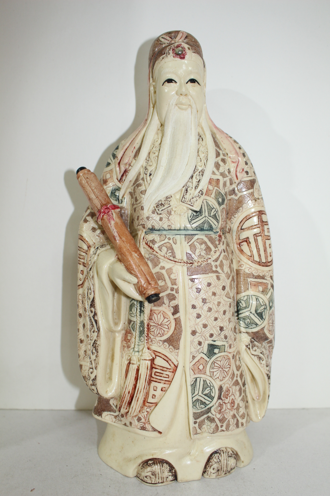 특이한재질로 채색조각된 도인 조각상