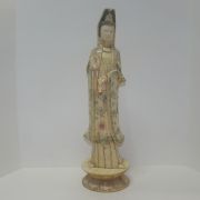 우각재질로된 관음불 입상