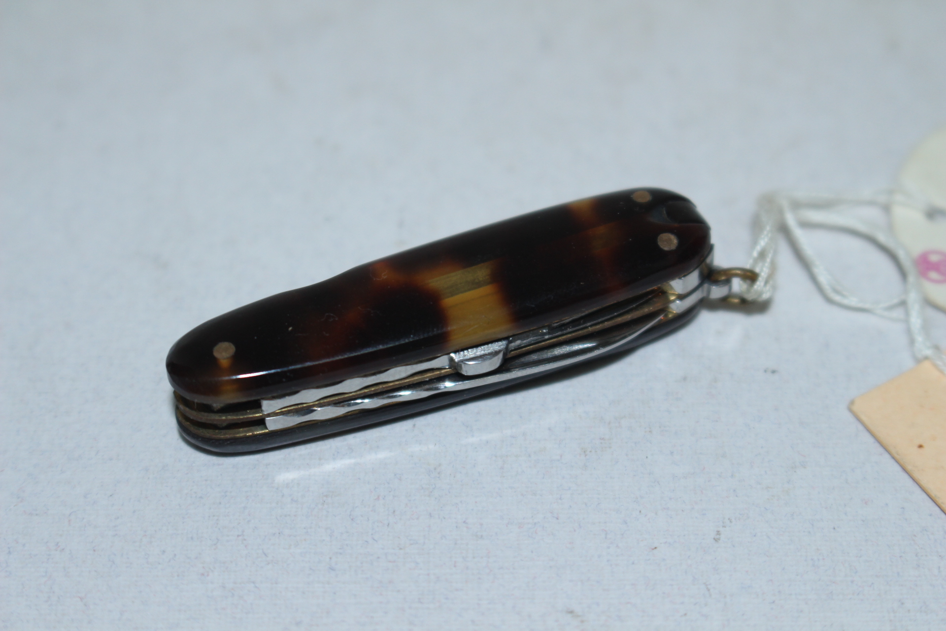 거북이 등껍질 데모재질로된 휴대용 미사용 칼