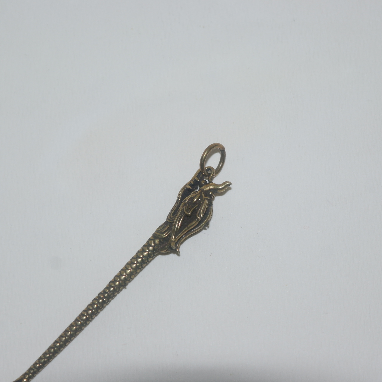 티벳 청동으로된 용머리모양 귀파개