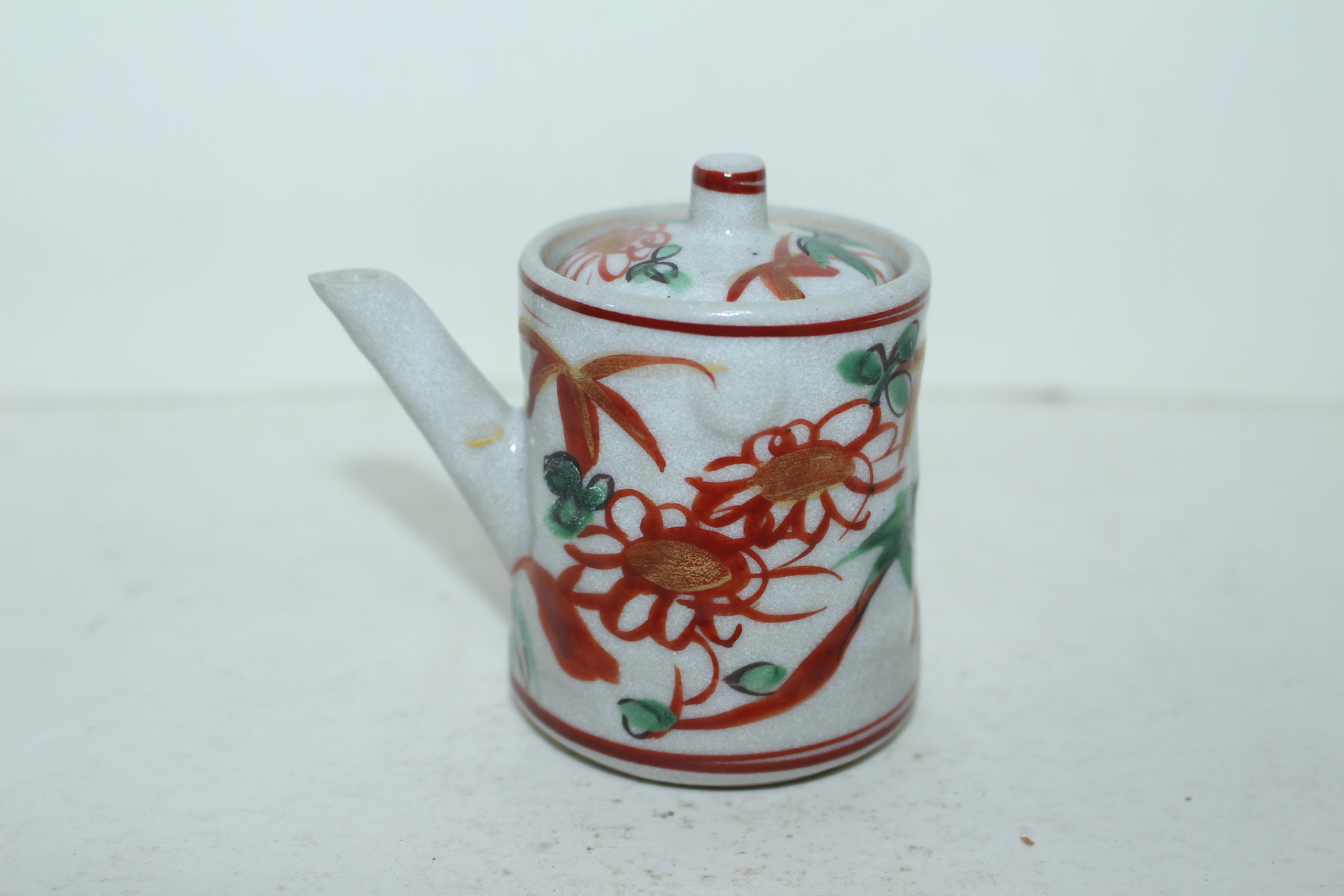 진사백자화문 주자호