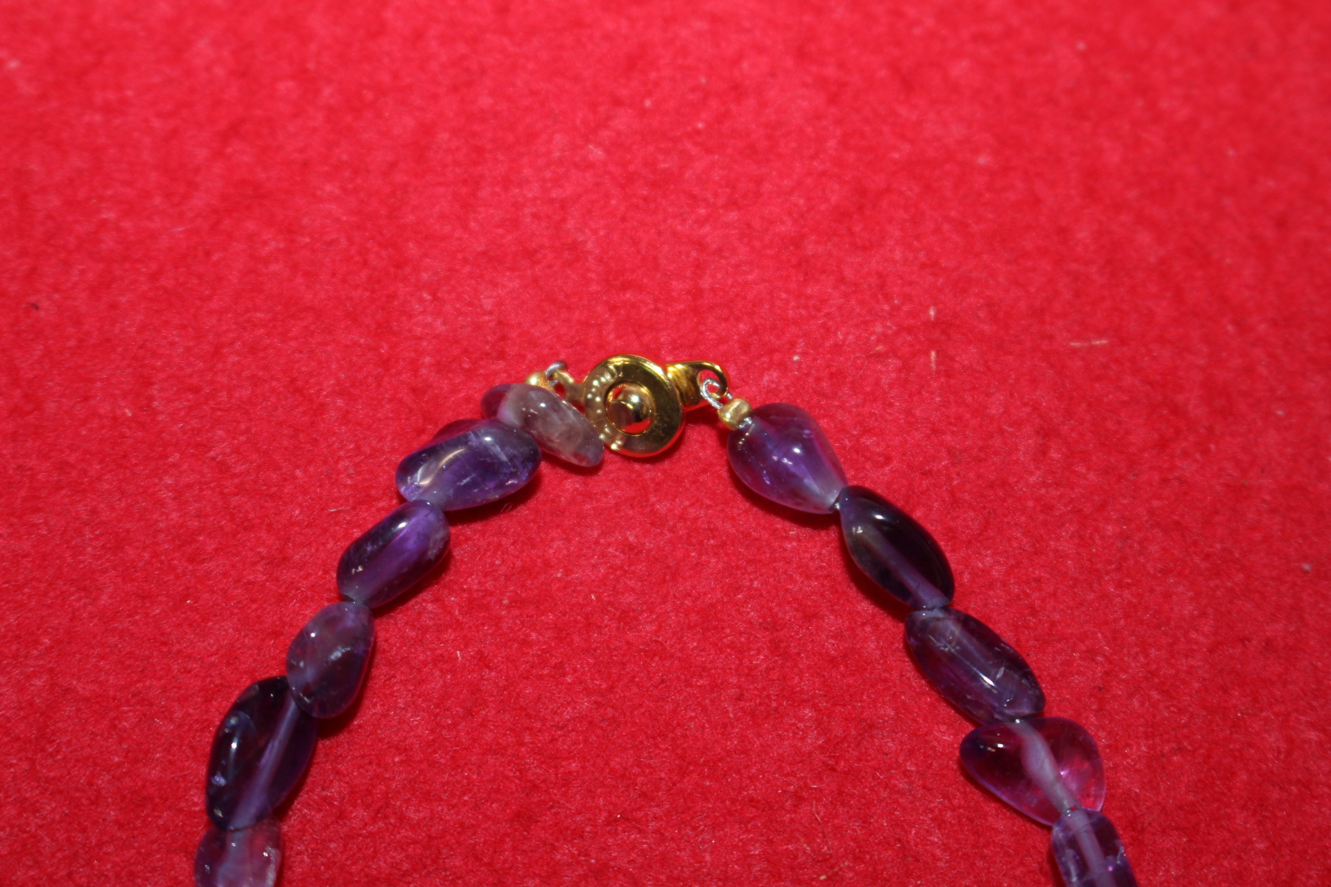 자수정 보석으로된 팔찌