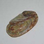 퇴화황옥돌로 어문이 조각된 옥노리개